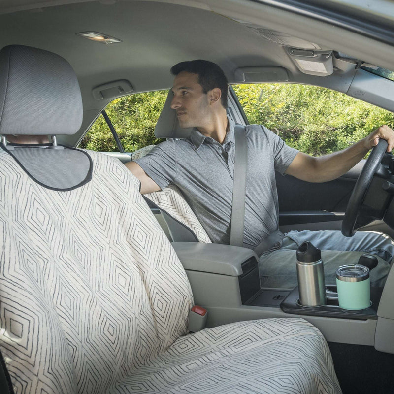 Man looking back on Boho Dot Front Car Seat Cover From SeatSpin